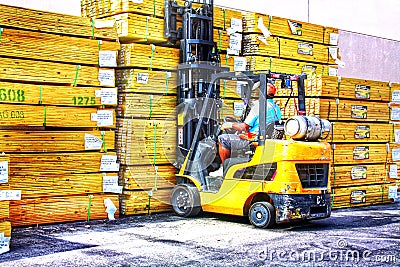 Man at workâ–ª forklift employee wearing a vest Editorial Stock Photo